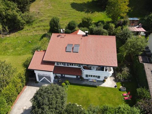 an aerial view of a house with a red roof at Apartment Regina in Burgberg
