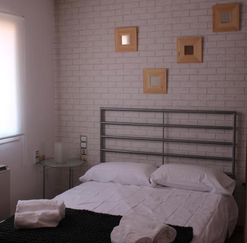 Llit o llits en una habitació de SENTIR VIC