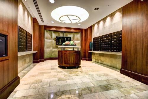 a wine tasting room with a wooden wall at Harbor apartments Free indoor Parking in Baltimore