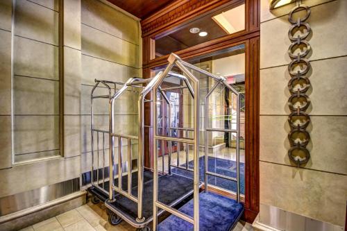 a hallway with a metal staircase in a house at Harbor apartments Free indoor Parking in Baltimore