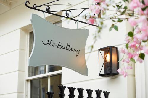 a sign for a wedding at the building at Room Mate Lime Tree in London