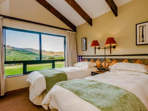 Katil atau katil-katil dalam bilik di aha Alpine Heath Resort