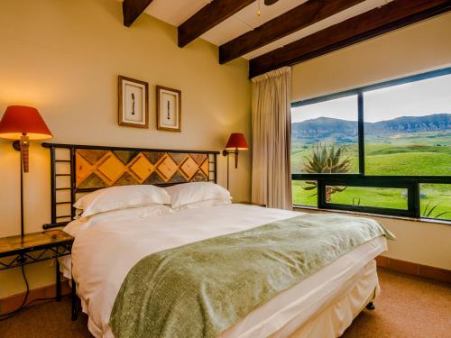 Säng eller sängar i ett rum på aha Alpine Heath Resort