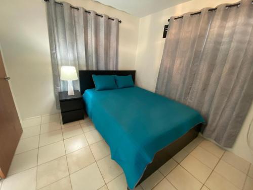 Postel nebo postele na pokoji v ubytování Mar Bonita Beach Apartment