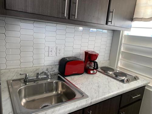 Kuchyň nebo kuchyňský kout v ubytování Mar Bonita Beach Apartment