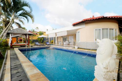 Πισίνα στο ή κοντά στο The Beverly Hills Bali Villas Jimbaran