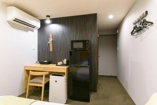 Una cocina o kitchenette en JP INN Kyoto Ekimae Mongakucho