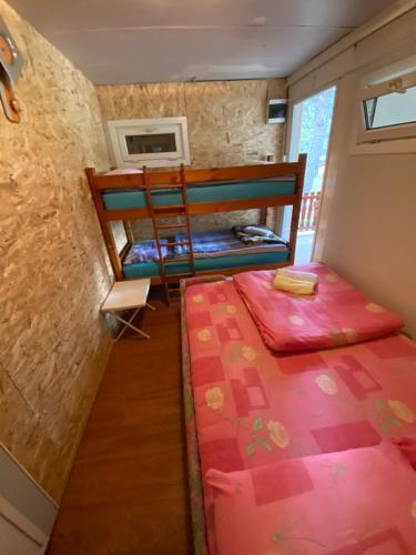 Postel nebo postele na pokoji v ubytování Vikendica Ubla