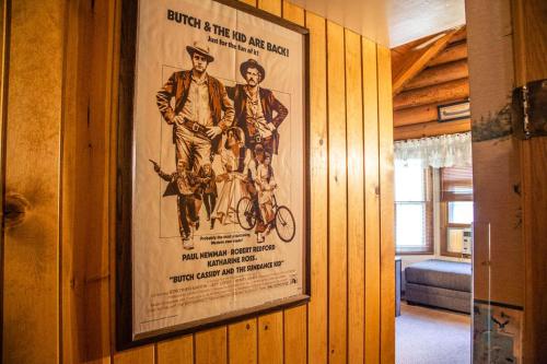 a movie poster hanging on a wall in a room at Eagle's Nest in Big Bear Lake