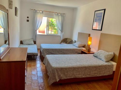 Postel nebo postele na pokoji v ubytování Casadaluz 86 - Porto dona Maria casa do mar , 2 bedrooms , Amazing sea view , salt water pool , wifi
