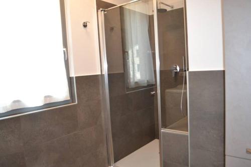 Phòng tắm tại Appartamento Casa Alpi