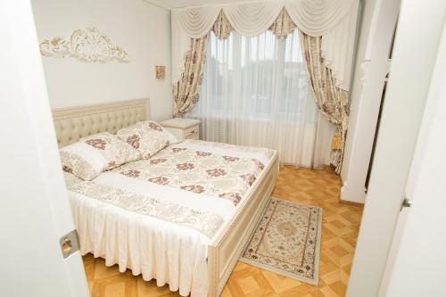 
Кровать или кровати в номере Gostinitsa Yubileynaya
