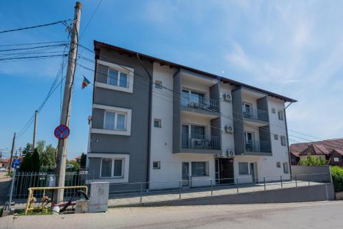 a building on the side of a street at Rania Apartments in Cluj-Napoca