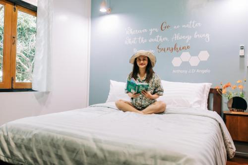 Кровать или кровати в номере Banya BnB ที่พักบ้านย่าบีแอนด์บี เมืองประจวบฯ