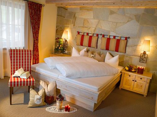 Postel nebo postele na pokoji v ubytování Boutique Hotel Montanara