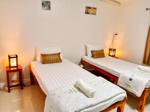 Postel nebo postele na pokoji v ubytování kanya house 3 whole house not share
