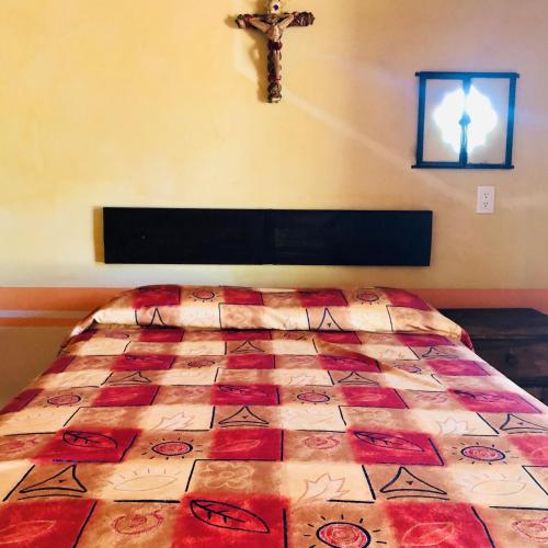 Una cama o camas en una habitación de Cabañas el Pajar
