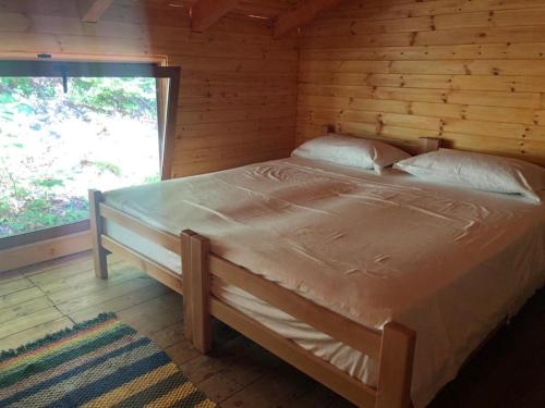 Ένα ή περισσότερα κρεβάτια σε δωμάτιο στο Bee Eco Guest House