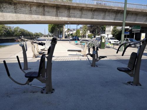 a row of exercise equipment on a city street at AUBERGE DE JEUNESSE D'ORLEANS in Orléans