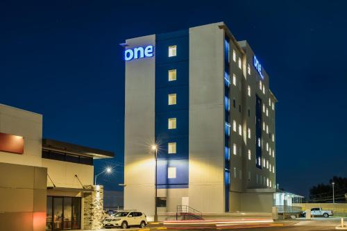 a building with a one sign on the side of it at One Mexicali in Mexicali