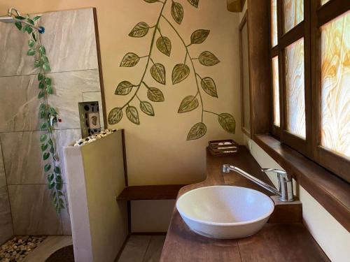 a bathroom with a sink and a shower at Villas Adriana, Palenque in Palenque