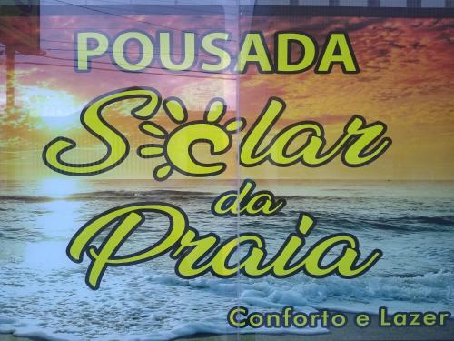 un panneau indiquant pousada saat la praia dans l'établissement Pousada Solar da Praia, à Guarapari