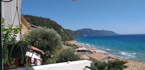 a view of a beach and the ocean at Glyfada New Era Home 107 Menigos Resort Apartments in Glyfada