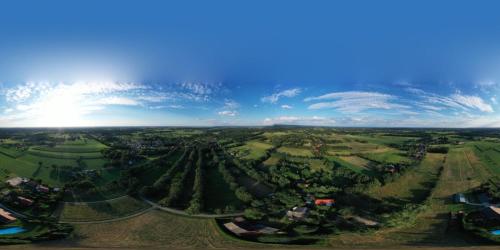 an aerial view of a park with trees and houses at Ediths Haus in Rhauderfehn