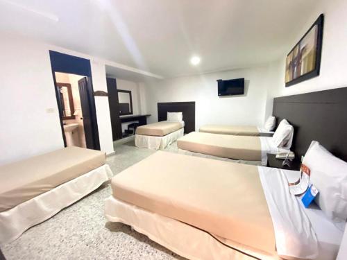 Cama o camas de una habitación en Hotel Arawak Upar