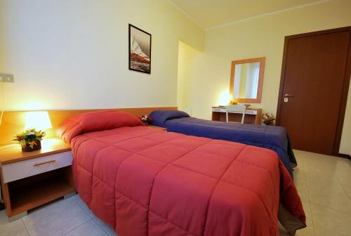 Кровать или кровати в номере Il Piccolo Golf