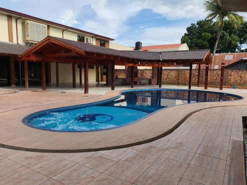 Πισίνα στο ή κοντά στο Tororoi Riberalta Apartments