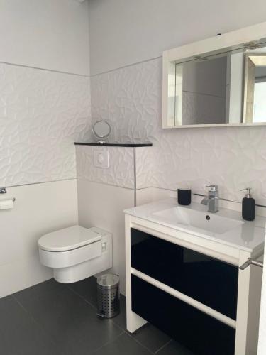 Ванная комната в Chambres d'hôtes CASA COSY