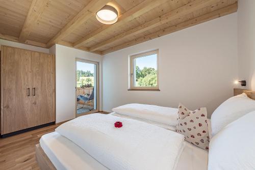 Un pat sau paturi într-o cameră la Foreserhof
