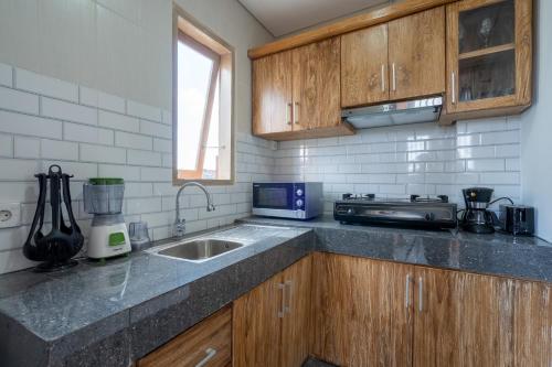 Kuchyň nebo kuchyňský kout v ubytování Samas Apartment