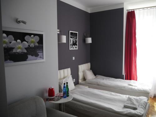 Ένα ή περισσότερα κρεβάτια σε δωμάτιο στο Residence B&B La Fontaine Aparthotel