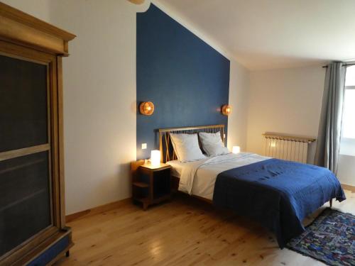 Postel nebo postele na pokoji v ubytování L'auguste maison d'hôtes