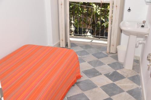 Letto o letti in una camera di Pensión Las Cuatro Naciones