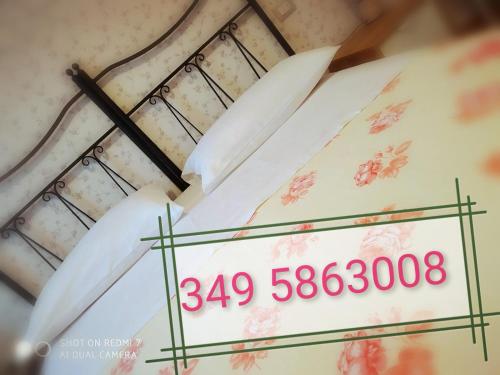 Ένα ή περισσότερα κρεβάτια σε δωμάτιο στο B&B Mariele