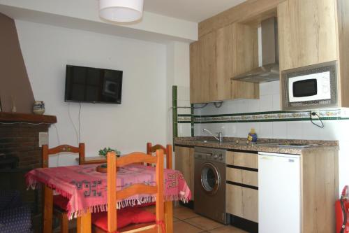 Kuchyňa alebo kuchynka v ubytovaní Apartamentos y Casas Rurales Las Terrazas de la Alpujarra