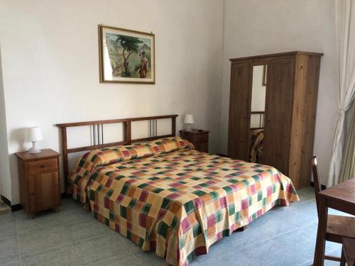 Ένα ή περισσότερα κρεβάτια σε δωμάτιο στο Rocca Sul Mare Hotel