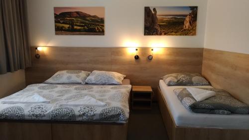 Postel nebo postele na pokoji v ubytování Penzion Kometa