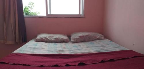 Uma cama ou camas num quarto em Vidigal Varandas Hostel