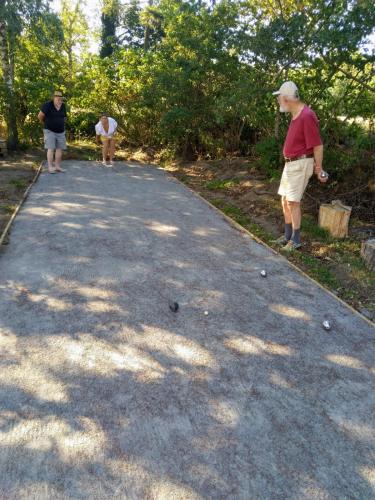 a group of people playing a game of golf at The Cherry Apartment - 'Den Gule Svane' Guest House near Rønne & Beach in Rønne