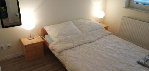 Posteľ alebo postele v izbe v ubytovaní Apartament Maja