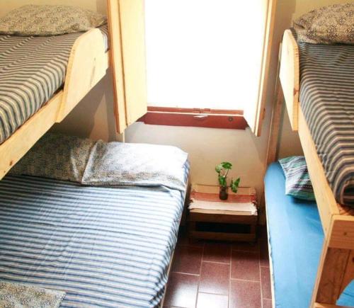 Кровать или кровати в номере Morada da Águia