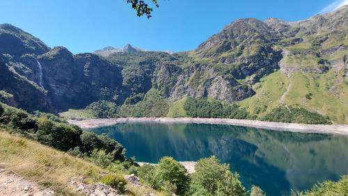 a view of a mountain lake in the mountains at LE 41 AVENUE FOCH in Luchon
