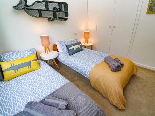Cama o camas de una habitación en The Poop Deck