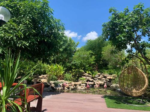 Un jardín fuera de BaanSuanklaiKlungBangkrachao บ้านสวนใกล้กรุงบางกะเจ้า
