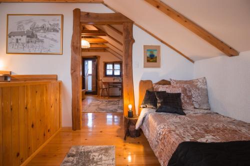 a bedroom with a bed in a room at Villa Brallissima in Sveti Martin na Muri