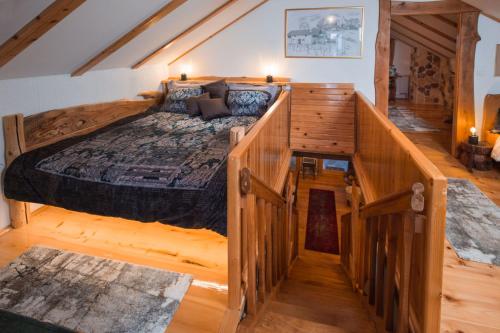 a bedroom with a large bed in a room at Villa Brallissima in Sveti Martin na Muri